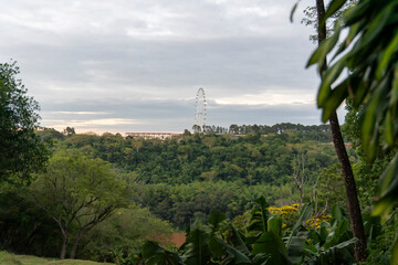 The "Three Borders Landmark" in Puerto Iguazú is an iconic tourist attraction that marks the confluence of Argentina, Brazil, and Paraguay, where the Paraná and Iguazú Rivers meet.The ferrys wheel.