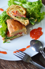 Fresh Croissant Sandwich with Lettuce and Smoked Meat