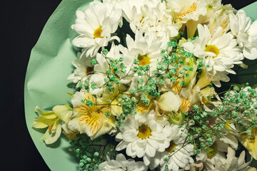 Bouquet of flowers. White chrysanthemums, lilies.