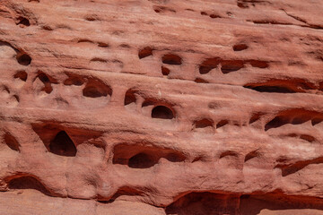 red Aztec Sandstone outcrops, Early Jurassic geological formation of primarily eolian sand. Fire Wave Trail, Valley of Fire State Park, Clark County, Nevada geology.  Weathering.Tafoni (tafone)	