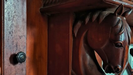 Traditional Craftsmanship: Horse Carving and Cabinetry © Elbrandan