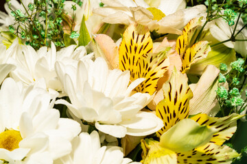 Bouquet of flowers. White chrysanthemums, lilies.
