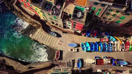 Aerial drone view of Cinque terre coast in Italy, Italian riviera in Liguria aerial view, fishing village of Riomaggiore, holiday in Cinque Terre, Italy - Powered by Adobe