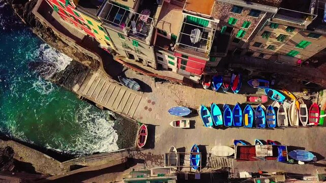 Aerial drone view of Cinque terre coast in Italy, Italian riviera in Liguria aerial view, fishing village of Riomaggiore, holiday in Cinque Terre, Italy