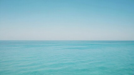 Obraz premium Serene Blue Ocean With Clear Sky and Tranquil Horizon View. 