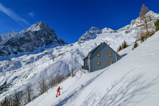 Woman ascending towards Prielschutzhaus, Totes Gebirge, Upper Austria, Austria