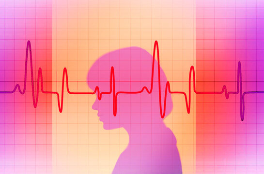 Silhouette of a woman with heartbeat graph in vibrant colors representing health and technology