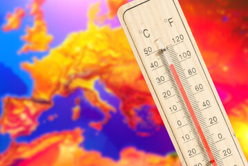 Fototapeta premium Thermometer and map of Europe in reddish colors symbolize climate change and a heat wave