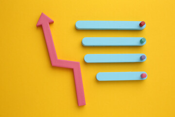 Multicoloured arrows pointing up and down. Symbolise growth progress, success in business finance. Rising bars of graphs represent market trends, return on investment, business development, financial