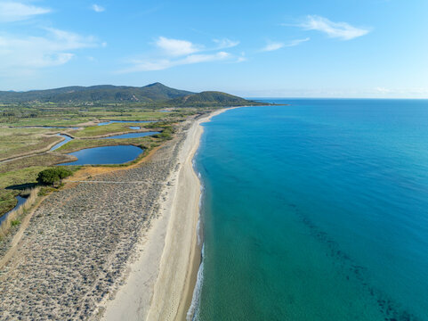 Aerial view of Spiaggia Di Sutt'e Riu beach in Posada, Sardinia, Italy