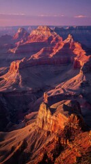 Dawn light on the Blue Ridge Mountains, layered ridges fading into purple mist under a soft sky
