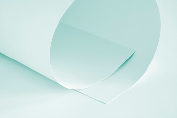 A sheet of paper in soft, cool pastel tones as a background for designer artistic solutions.
