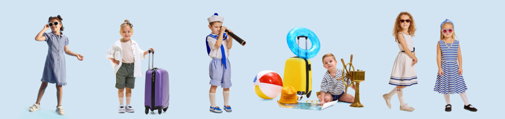 Children dressed like sailors or travelers with beach toys and luggage against pastel blue...