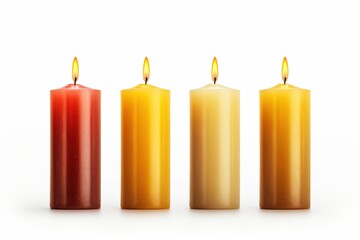 Four scented candles with flames in a cozy indoor setting