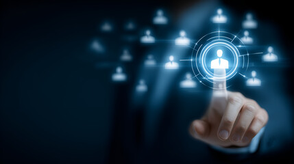 concept of recruitment and talent acquisition. A finger pressing a button on a digital screen representing human resources and networking connections. The futuristic design adds a modern aesthetic