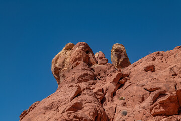 Desert varnish, red Aztec Sandstone outcrops. Rainbow Vista Trail, Valley of Fire State Park, Clark County, Nevada geology. Weathering joints