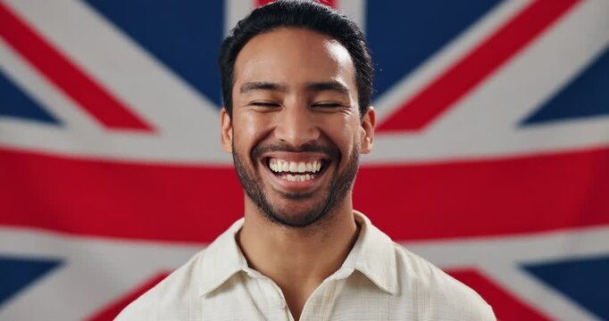 Face, laughing and nation with man on British flag for government elections, patriotism or politics. Country, culture or democracy and funny person with Union Jack of United Kingdom for voter pride