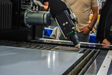 Industrial Precision Laser Cutting Machine at Work Manufacturing Metal Parts with High Accuracy and...