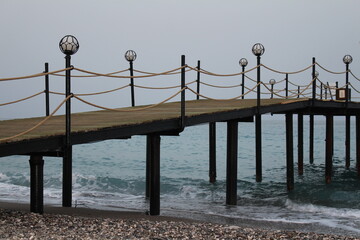 pier in the evening, seashore, relaxation, moments of peace and quiet