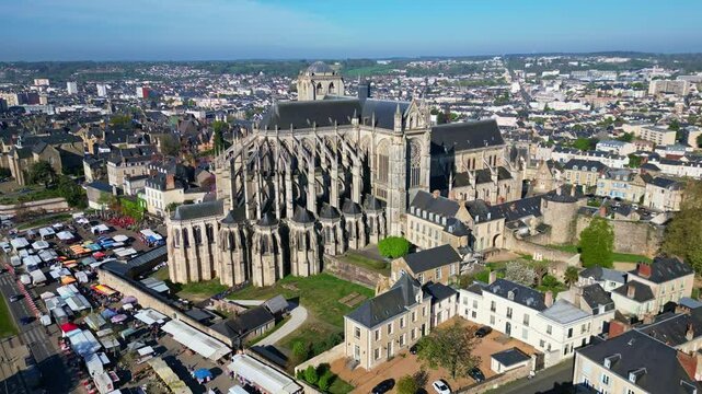 Historic city of Le Mans, with Cathedrale Saint-Julien and surrounding urban area, Sarthe, France. Aerial backward