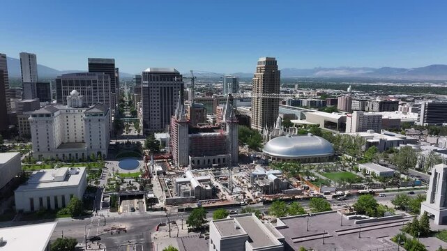 Aerial Salt Lake City Utah LDS Temple Square 2 pull. City center downtown business and religious headquarters. The Church of Jesus Christ of Latter-day Saints temple square. Capitol city urban.