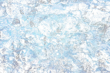 Distressed Grungy Blue Overlay Dry Coral Rock Wall Texture from Tropical Coastline with Natural Holes