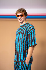 Smiling Male Wearing Summer Clothing in the Studio