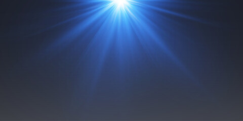 Fototapeta premium Blue light rays of light and star explosion.