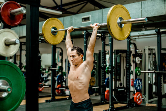 Man deadlifting at gym