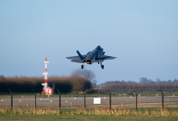 F-35 stealth fighter jet taking off during a NATO exercise at an airfield
