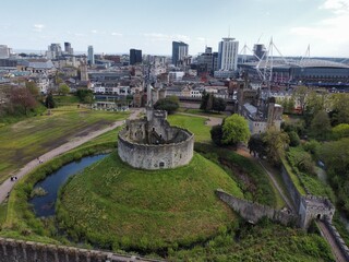 Aerial view of Cardiff Castle surrounded by green space and urban landscape. Showcases the blend of...
