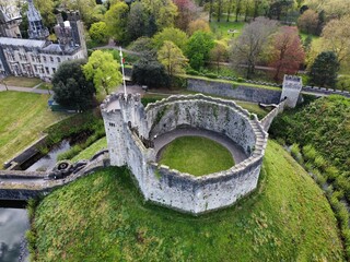Aerial view of Cardiff Castle, showcasing its historic architecture and surrounding greenery, perfect for cultural tourism and heritage exploration.