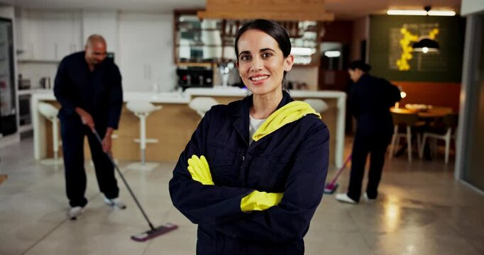 Janitor, woman and arms crossed with face, cleaning service and wet floor for disinfection. Portrait, safety and manager for sanitation group, maintenance worker and tile polishing for hygiene - Powered by Adobe