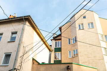 buildings and wires hanging from it
