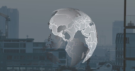 Image of globe over cityscape