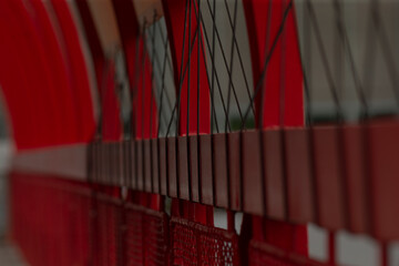 This perspective highlights the bridge railings and support cables, showcasing geometric lines and structural elements while emphasizing the artistic architectural design features