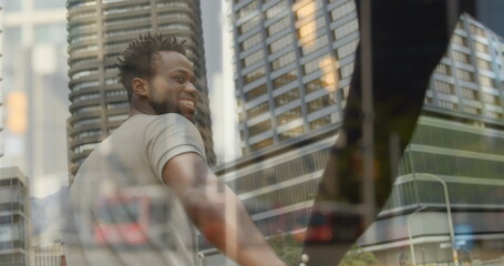 Image of blurred traffic over happy african america couple walking on street