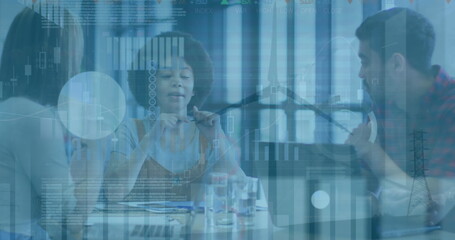 Image of financial data processing and wind turbine over diverse business people