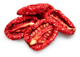 Halves of sun-dried plum tomatoes on white background. File contains clipping path.