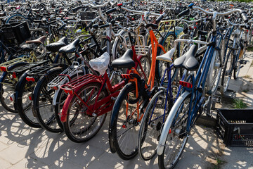 Large bike parking in Amsterdam near Sloterdijk station. Summer, sunny day.