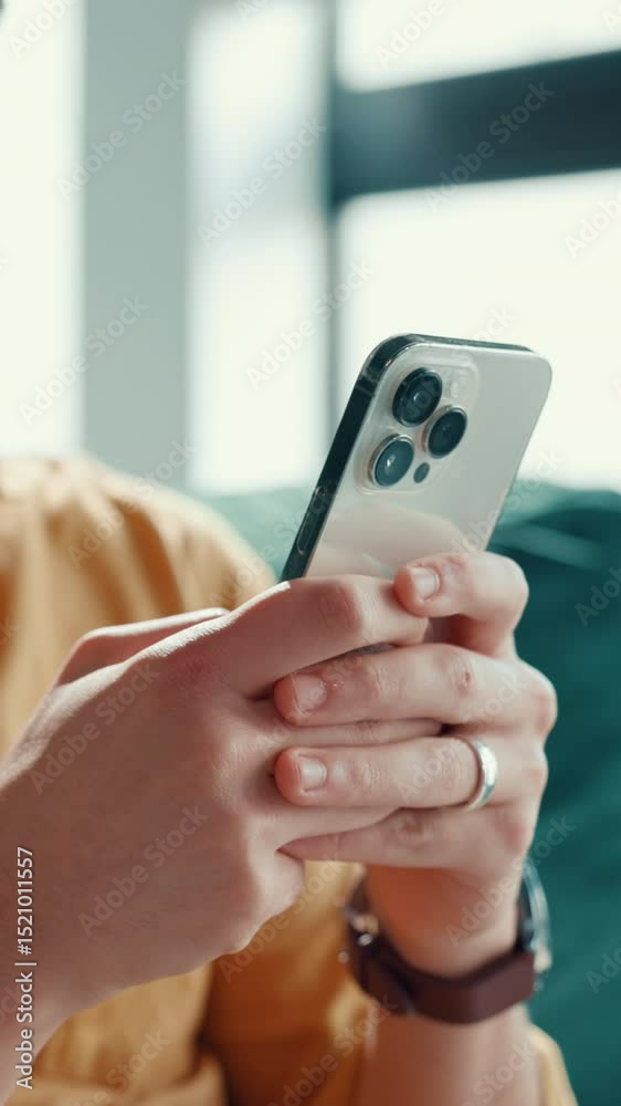 Aufkleber Man, hands and typing on mobile for social media, text response and browsing website in home. Person, phone and scroll in living room for app interaction, networking and engaging on forum platform