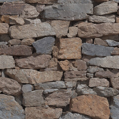 Seamless texture of weathered stone wall with varied colors and shapes for architectural and design...
