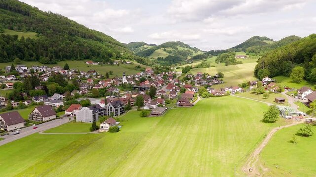 Charming aerial view of Holderbank, Solothurn in a lush green summer landscape