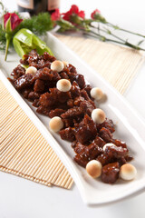 Wangzai mini steamed buns with braised beef cubes