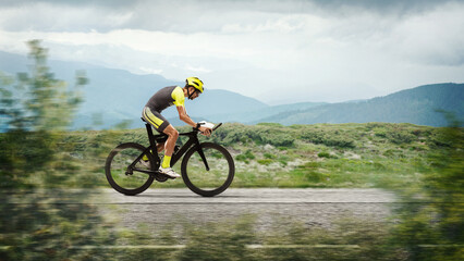 Dynamic collage. Young male triathlete riding bicycle on open road. Professional sportsman engaged...