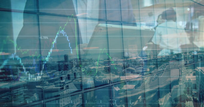 Image of financial graph and data processing over person using tablet - Powered by Adobe