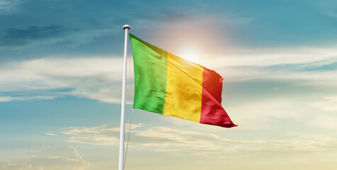 Mali national flag waving in beautiful sky with mast. A proud moment flag waving with sunlight.