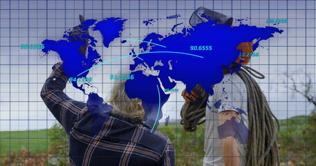 Image of world map over two lumberjacks