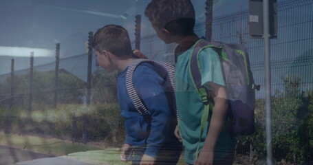 Image of timelapse with walking people over caucasian boys on zebra crossing