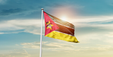 Mozambique national flag waving in beautiful sky with mast. A proud moment flag waving with...